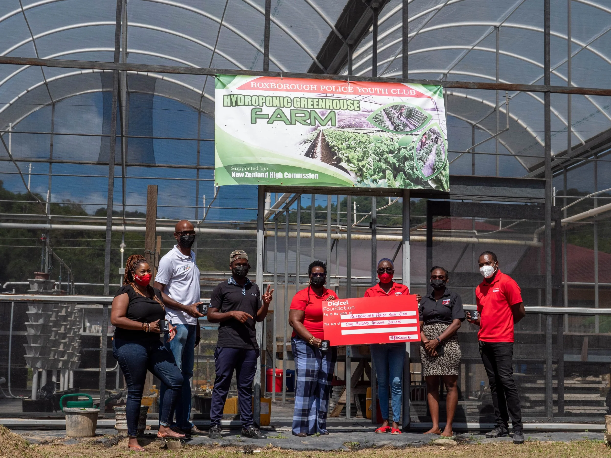 The Roxborough Police Youth Club receives its funding of TTD 100,000 which will be used to expand its Green House Hydroponics System.