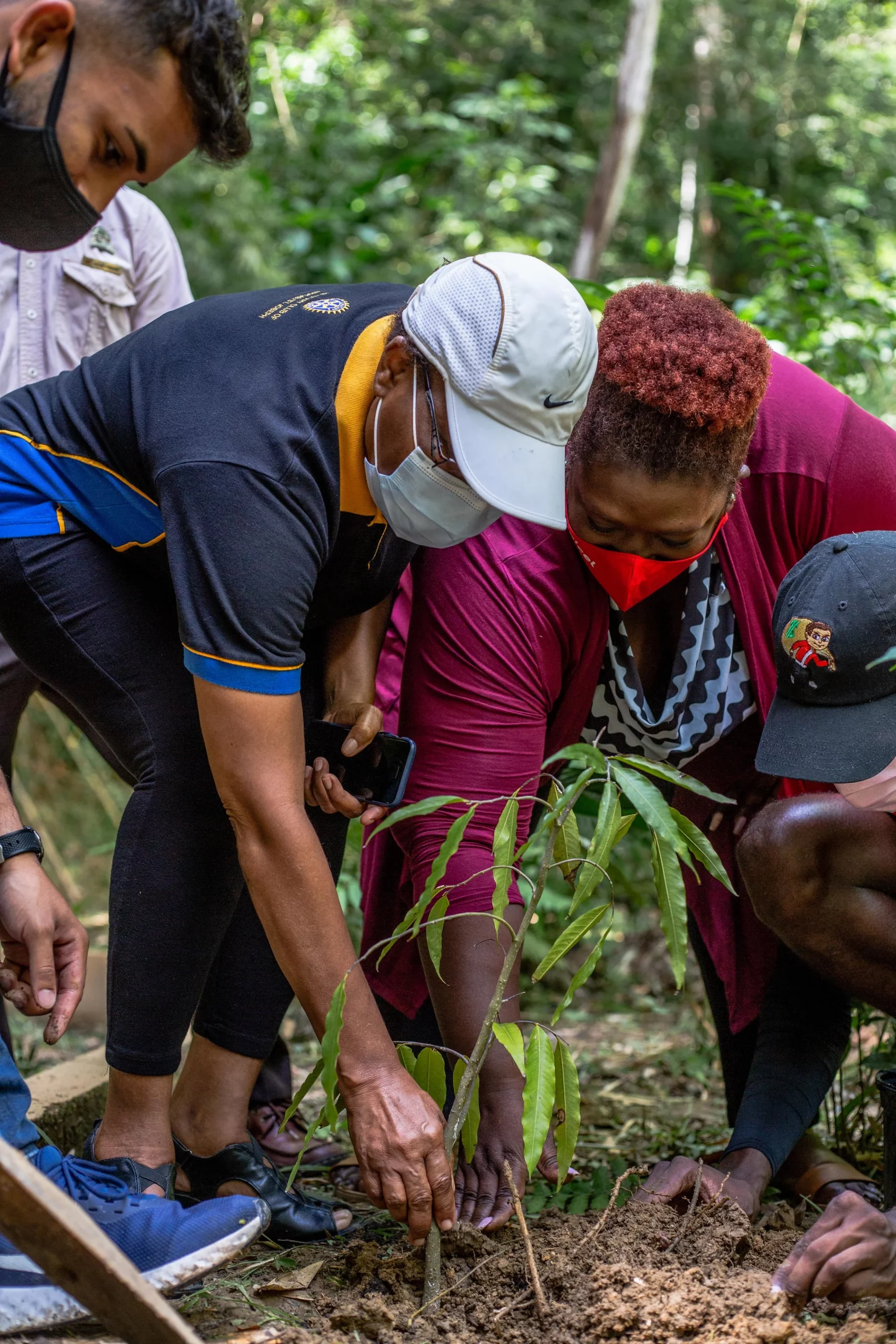 All hands were on deck for the tree planting which took place at the end of the brief ceremony.