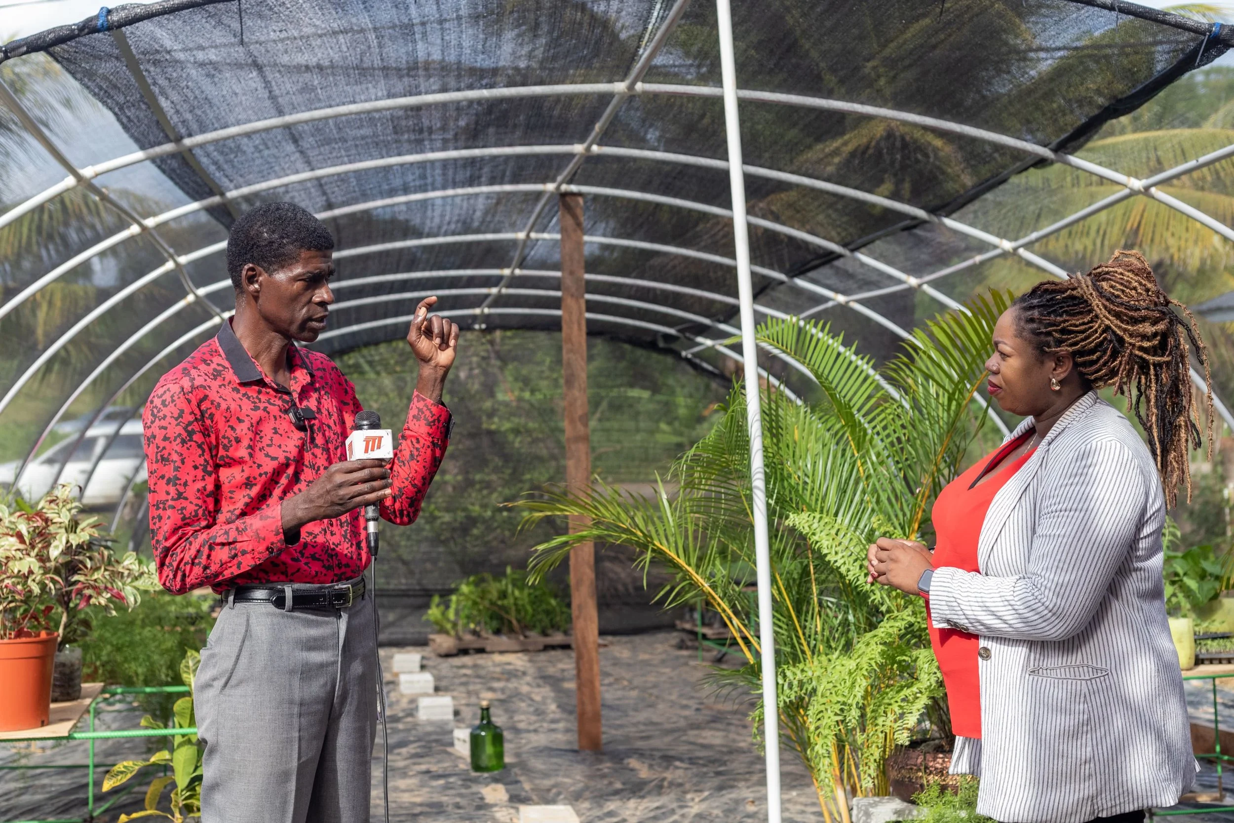 (L-R) The Moruga 2050 Association for Sustainability President- Francis Paul chats with Digicel Foundation Operation Manager, Cindy Ann Currency for a media interview at the launch of the project.