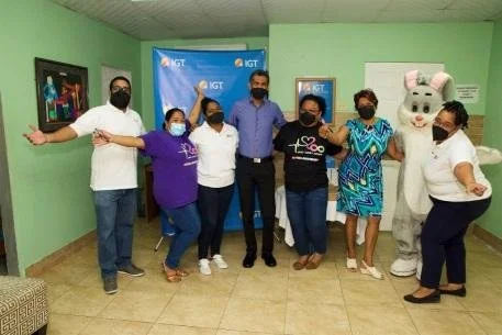 IGT Team members spread Easter cheer at the Autistic Society of Trinidad and Tobago (ASTT).