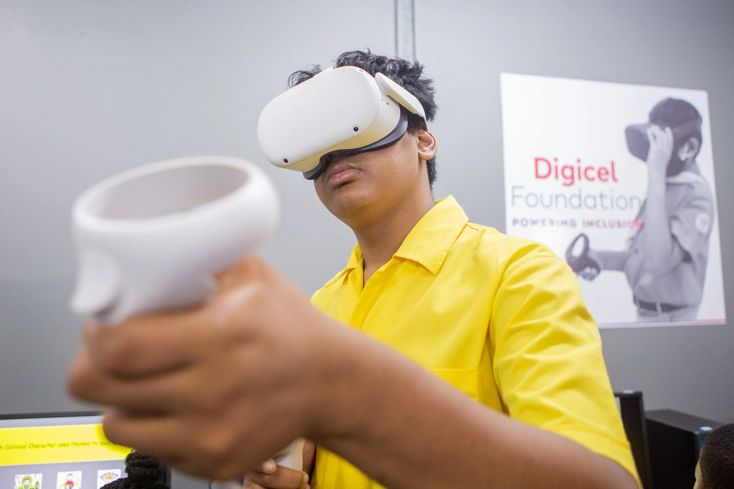 This student is fully immersed in another world of learning at his school’s Digicel Foundation Innovation Lab.
