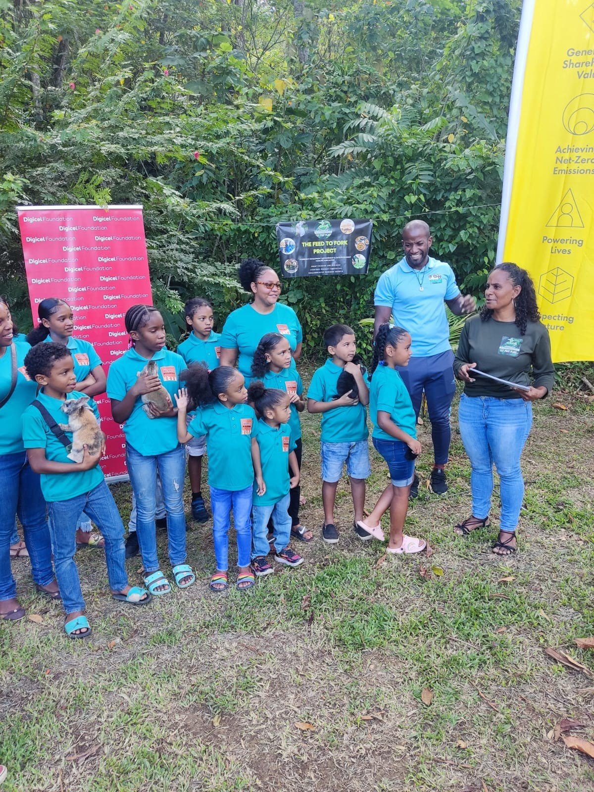 (Right) The president of One Seed for Change Lorraine Waldropt Fergusson gives these bunny builders words of encouragement during the ‘Feed to Fork’ initiative.