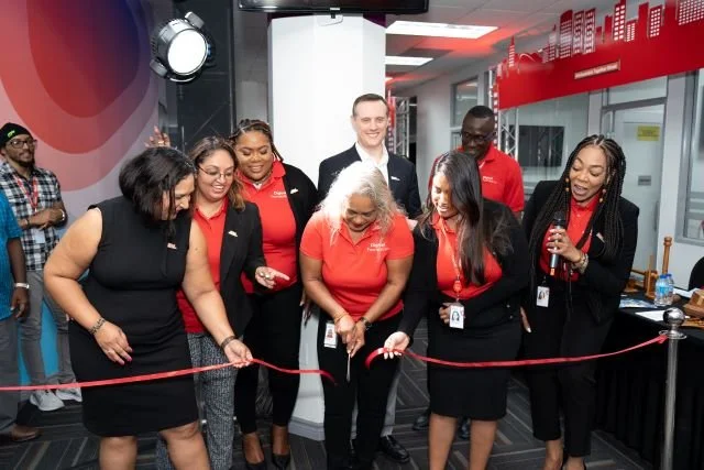 (L-R) Digicel Foundation Board Member Pamela Sankar cuts the ribbon to launch the staff open day at the Digicel Foundation’s AGM held on 26 July 2023 at its headquarters, Maraval Road, Port of Spain. She is joined by fellow Digicel Foundation Board Members and Digicel TT Executives (L-R) Trijata Maraj, Bibi Mohamed-Singh, La Toya Gopaul, Abraham Smith, Nalini Goorahlal, Guy Small and Penny Gomez.