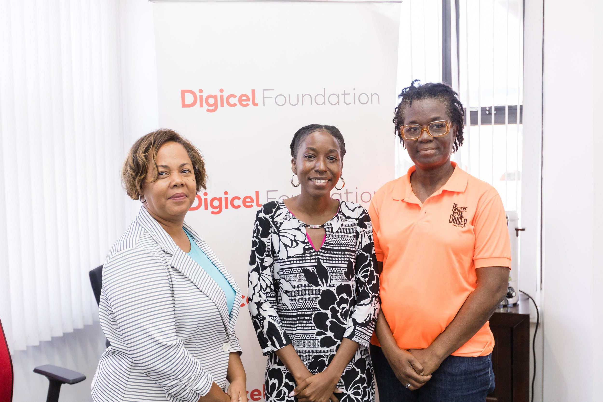 From left to right: Rowena Pitt, President of Tabitha’s Home for Women and Children with Jeanine Bernard and Avonelle Hector Joseph of ITNAC at the Digicel Foundation’s headquarters on Tuesday 5 December 2023.