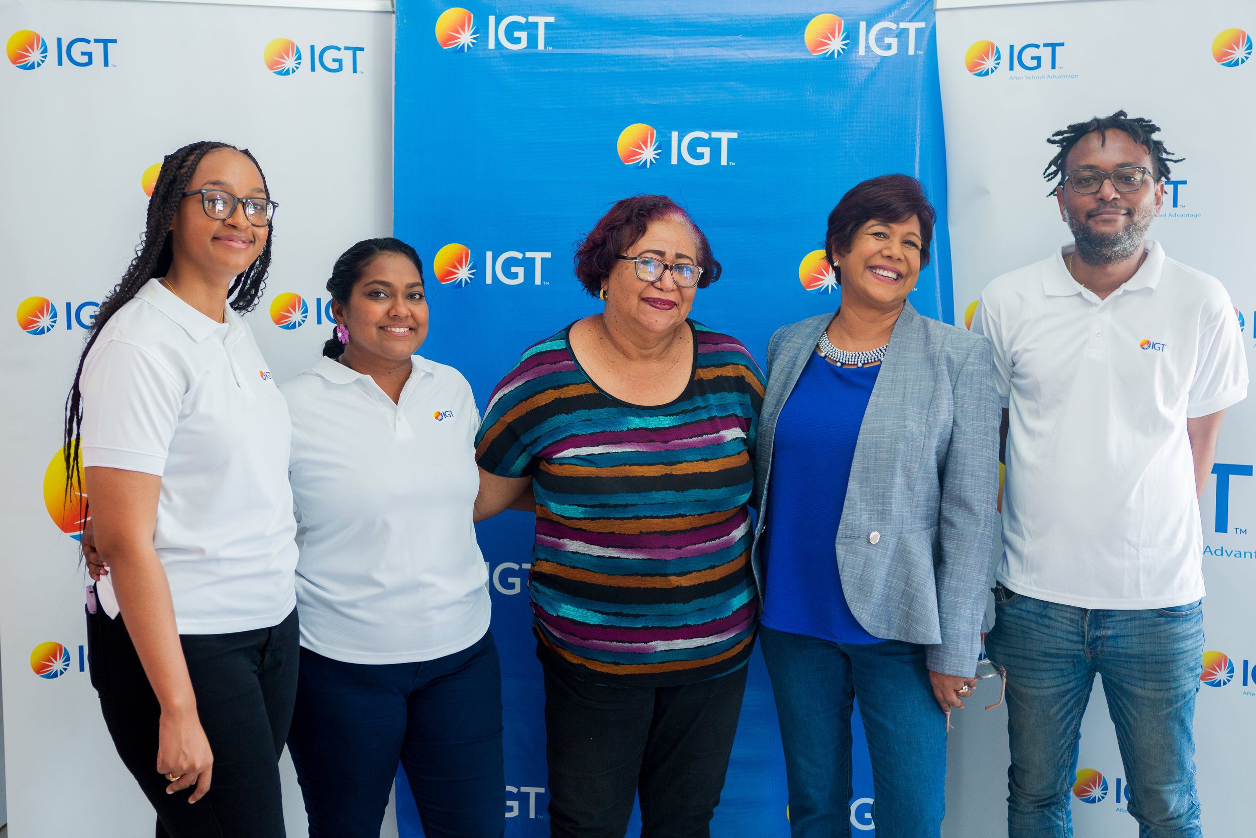 (L-R) Chelsea Alleyne, IGT Administrative Assistant; Tanya Singh, IGT Global People Services Representative; Ann Marie Rodriguez, Credo Sophia House Coordinator; Shavindra Tewarie-Singh, IGT People & Transformation Regional Senior Manager - Caribbean, and Darron Marcelle, IGT Courier, joined forces to recognise International Women’s Day at Credo Sophia House on Saturday, 2 March 2024.