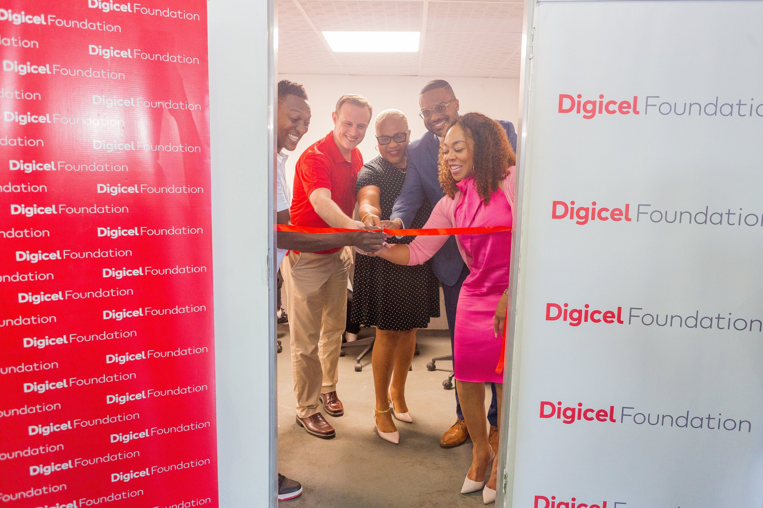 Mayor of Port of Spain Chinua Alleyne (third from right) joined representatives from The Digicel Foundation, PanTrinbago, Valley Harps Steel Orchestra, Pandemonium Steel Orchestra and Trinidad All Stars Steel Orchestra to cut the ribbon on the Digicel Foundation’s Technology in Education Centre at Pandemonium Panyard in Belmont earlier in 2024.