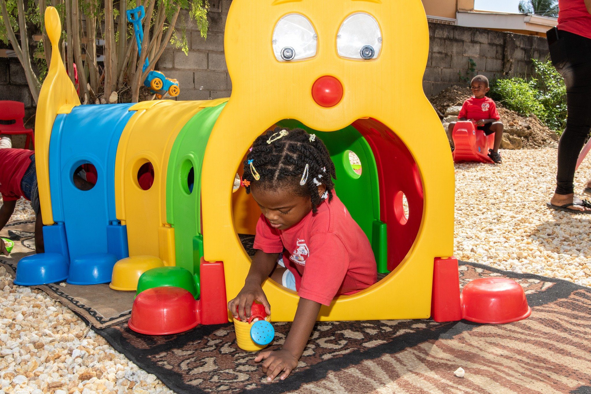 This lovely little one enjoys her new creative outdoor play area!