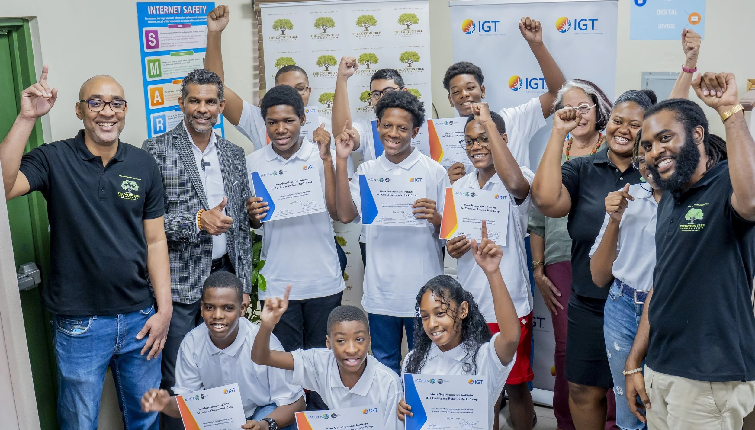 Camp participants from the Cotton Tree Foundation proudly show off their certificates as IGT’s Coding and Robotics Rock! Camp 2024 comes to a successful end on 26 July 2024.